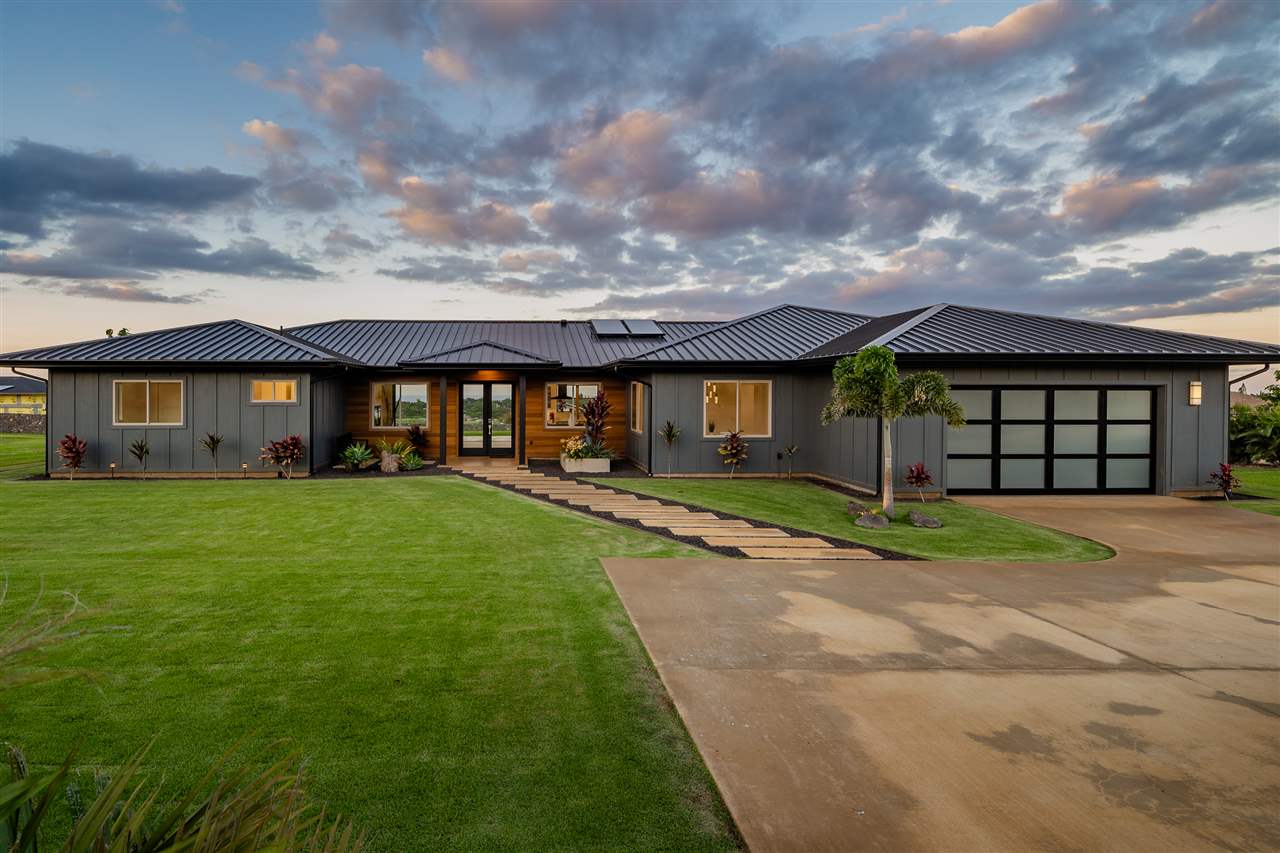 940 Auwaha Street, Unit A Haiku, HI 96708 - Photo 27 of 28 a view of a big house with a big yard and large trees