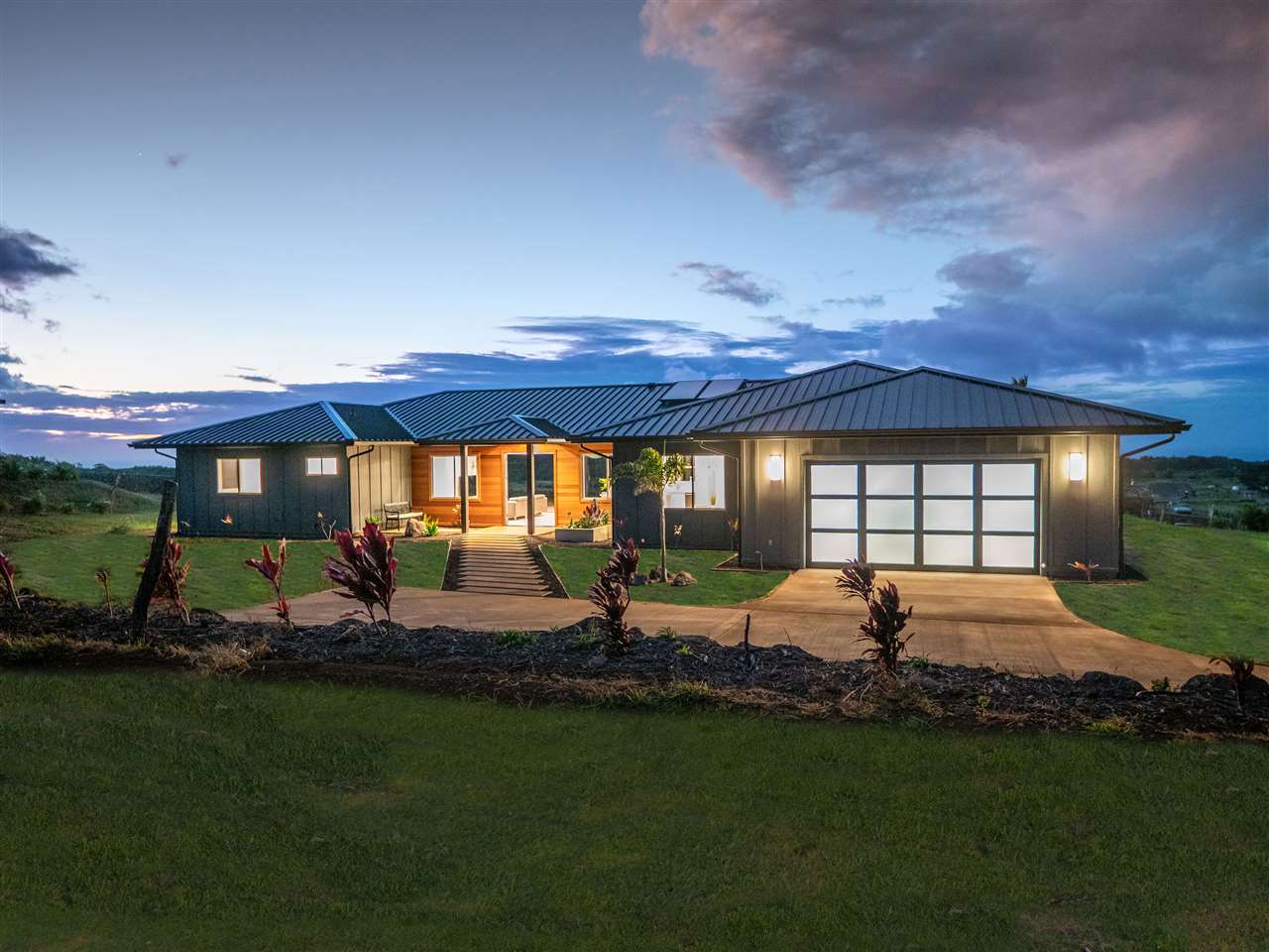 940 Auwaha Street, Unit A Haiku, HI 96708 - Photo 28 of 28 a view of a house with backyard and sitting area