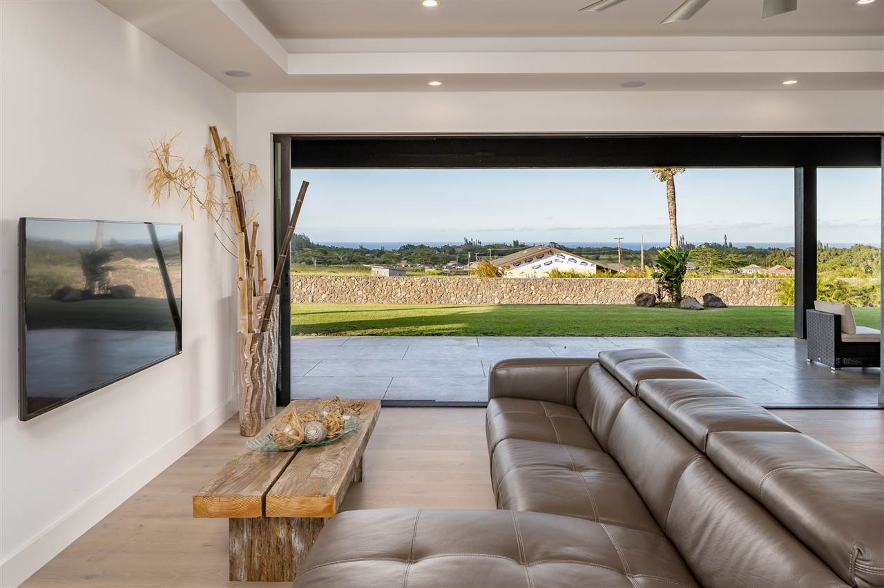 940 Auwaha Street, Unit A Haiku, HI 96708 - Photo 5 of 28 a view of swimming pool with outdoor seating and plants