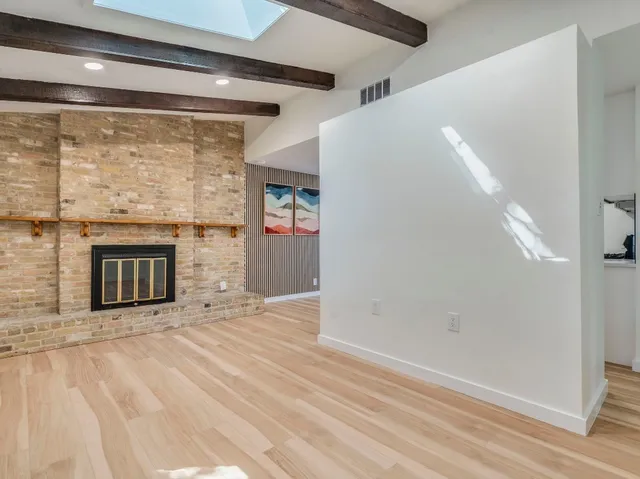 a view of a livingroom with a fireplace