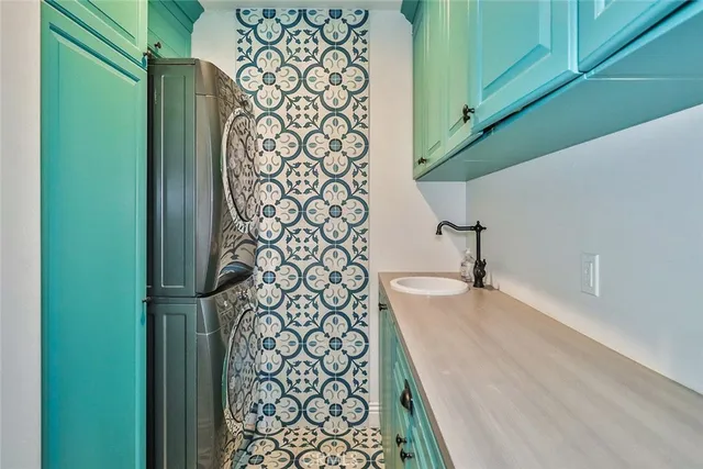 a bathroom with a shower and a sink