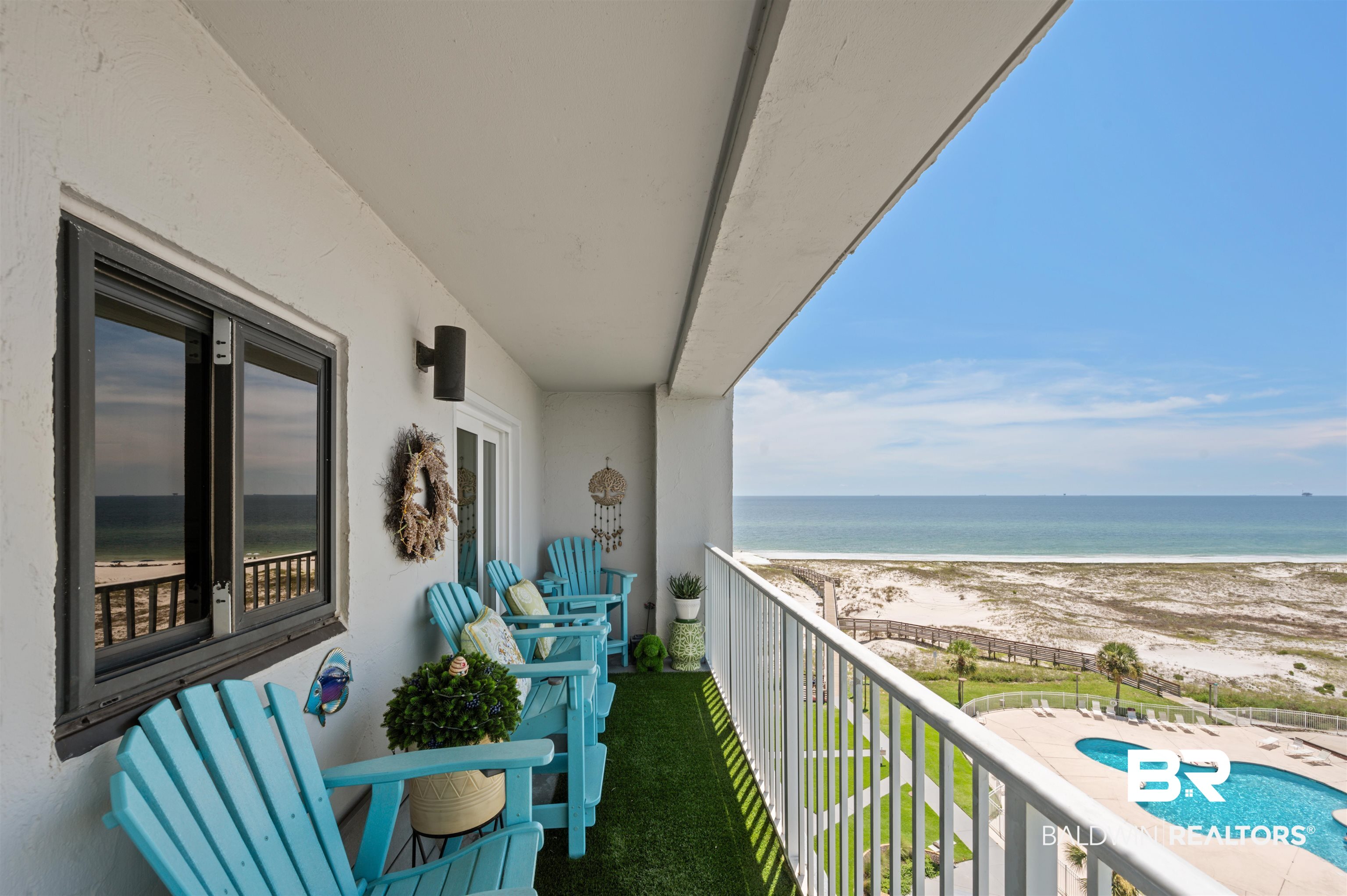 375 Plantation Road, Unit 5610 Gulf Shores, AL 36542 - Photo 16 of 33 Balcony featuring view of water and beach and view of pool area