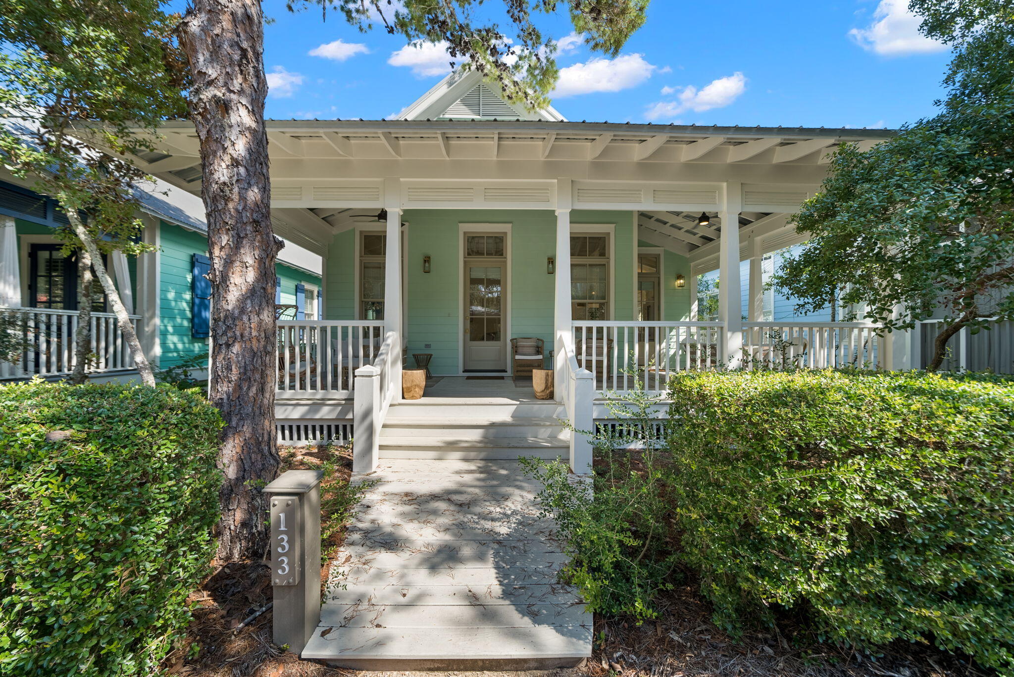 133 Silver Laurel Way Santa Rosa Beach, FL 32459 - Photo 2 of 42 a front view of a house with a yard