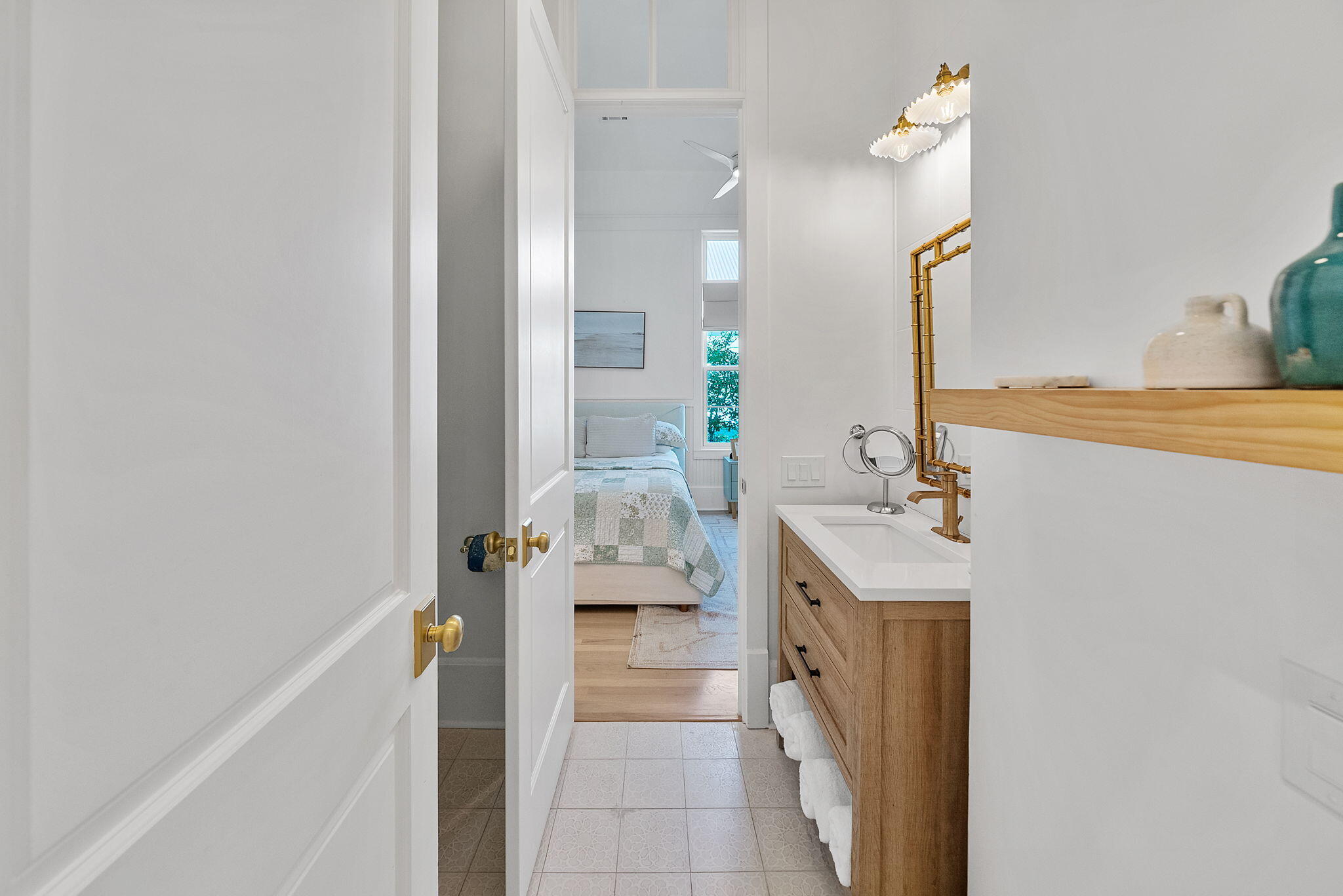 133 Silver Laurel Way Santa Rosa Beach, FL 32459 - Photo 21 of 42 a bathroom with a sink a mirror and a bathtub