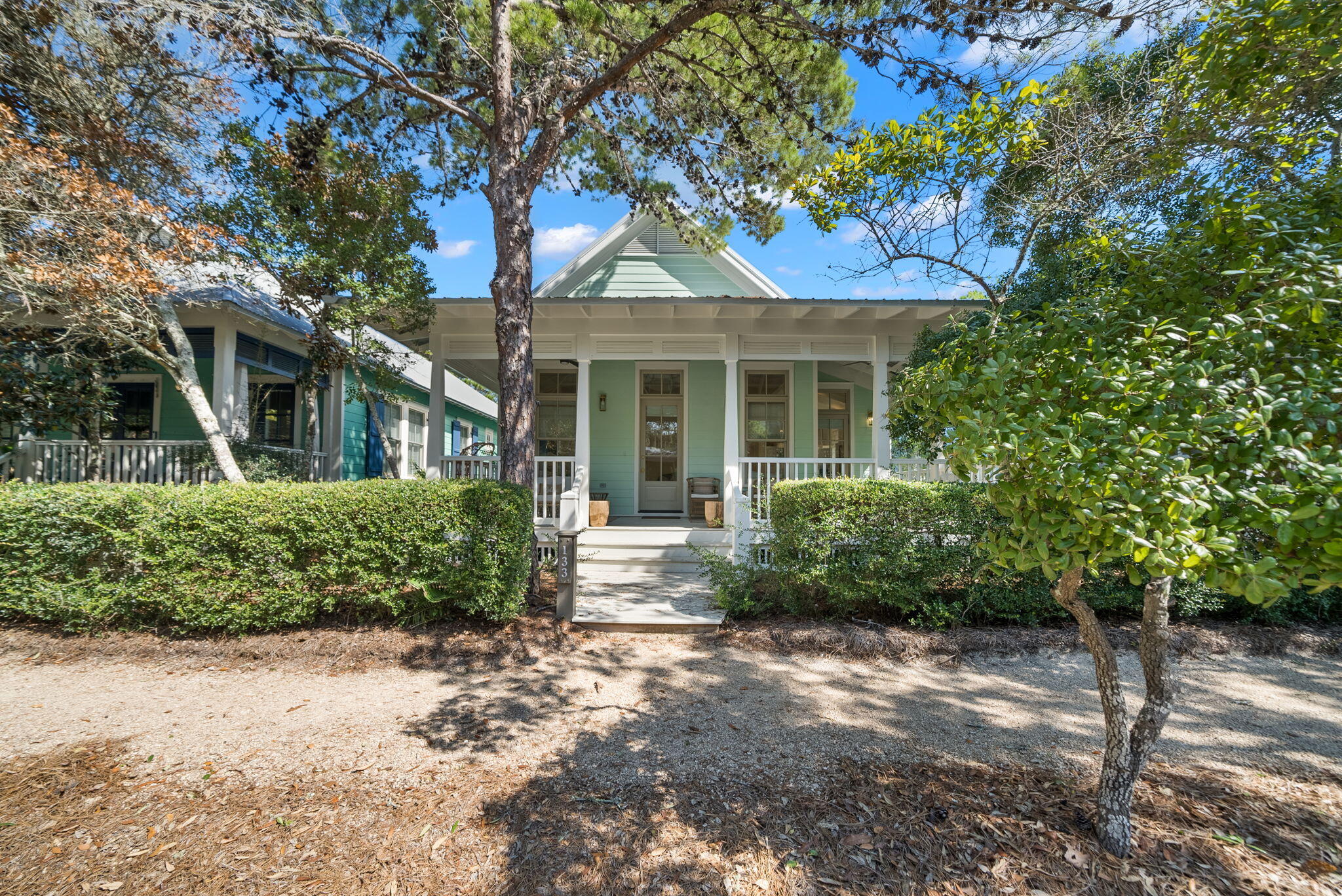 133 Silver Laurel Way Santa Rosa Beach, FL 32459 - Photo 25 of 42 front view of a house with a garden