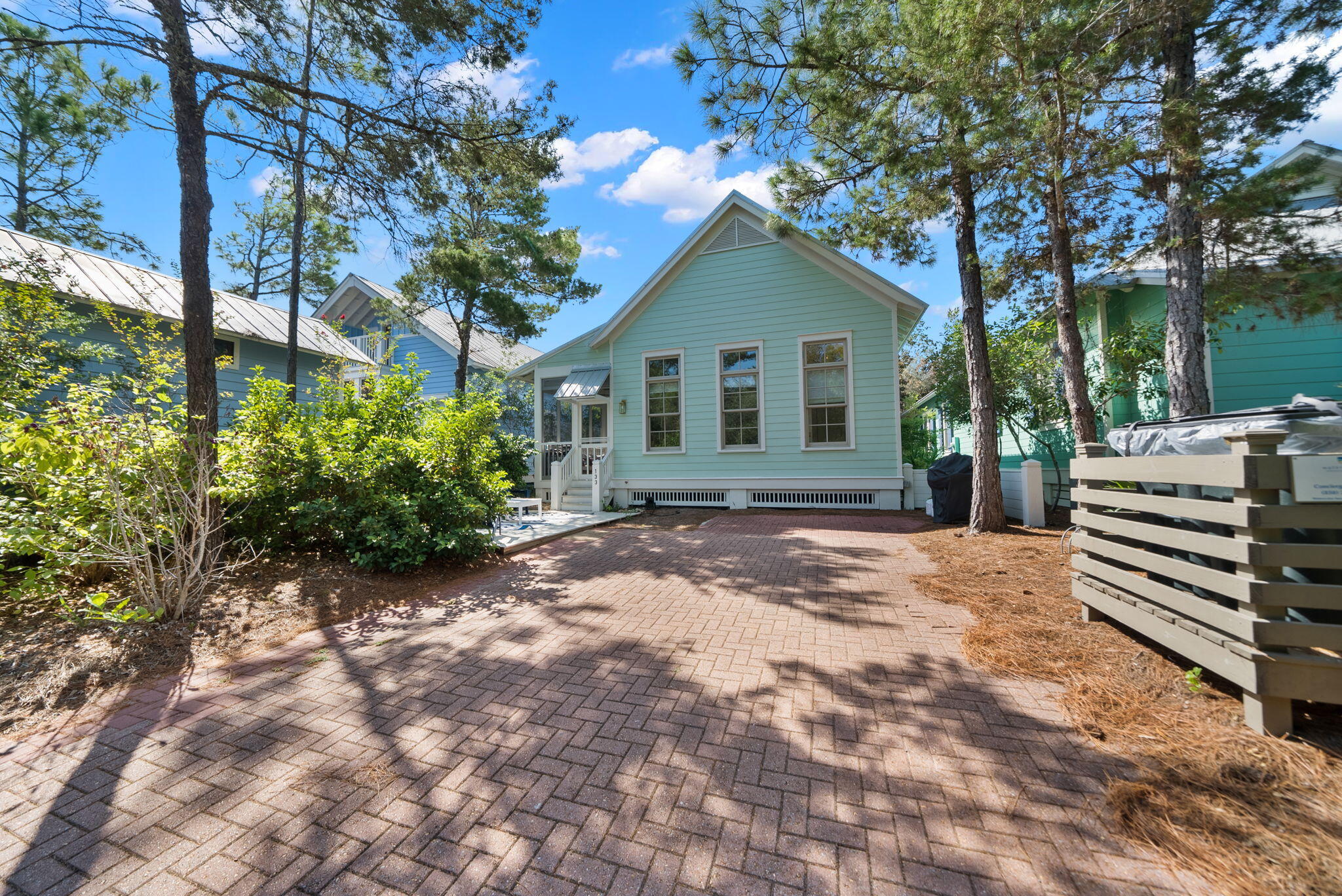 133 Silver Laurel Way Santa Rosa Beach, FL 32459 - Photo 29 of 42 a view of a house with a yard and potted plants