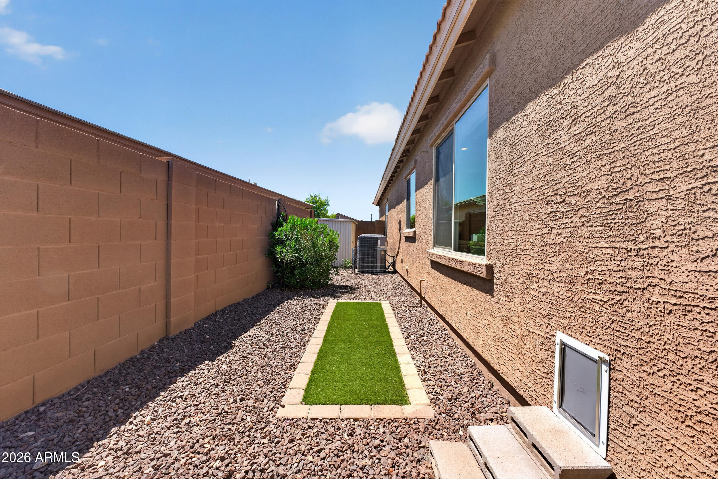 18612 West Mountain View Road Waddell, AZ 85355 - Photo 49 of 71 a view of house with backyard