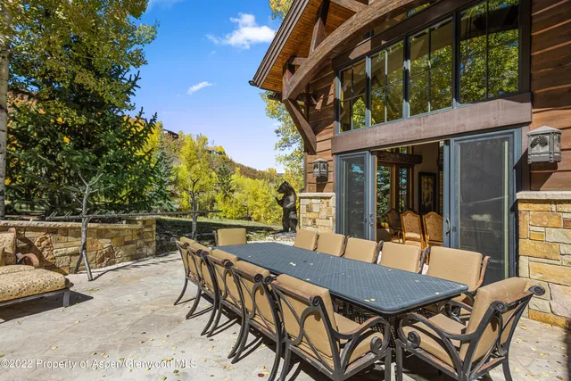 a view of a chairs and table on the terrace