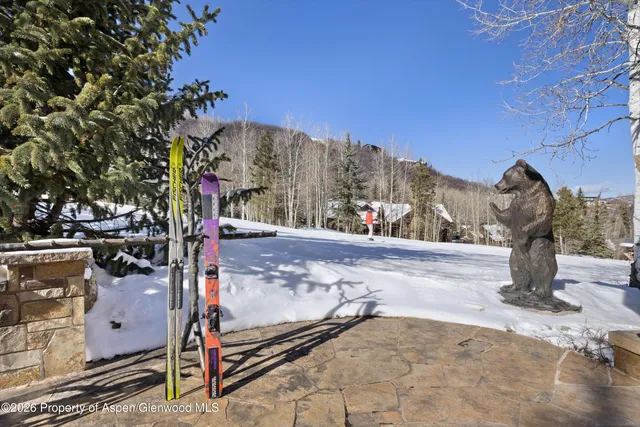a view of a road with a building in the background