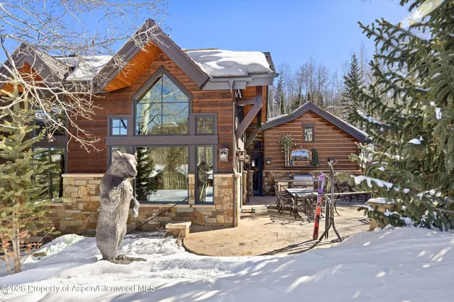 a view of a brick building with many windows