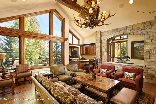 a view of a dining area with furniture window and outside view