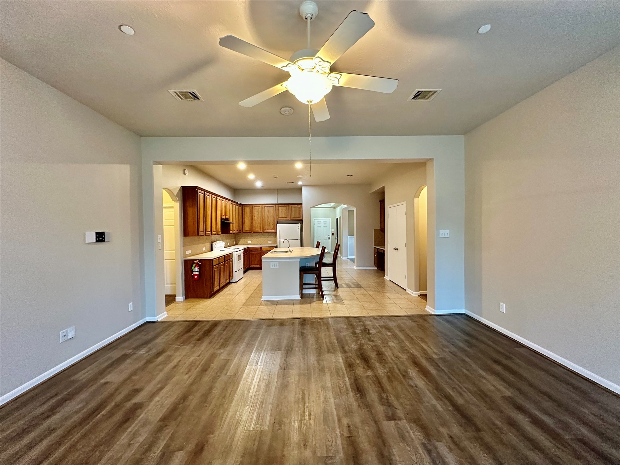 514 Dovecoft Lane Rosenberg, TX 77469 - Photo 7 of 35 Family room with kitchen view