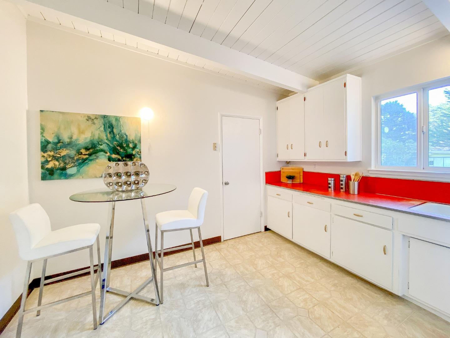 266 Hillside Drive Pacifica, CA 94044 - Photo 21 of 37 a room with furniture and window