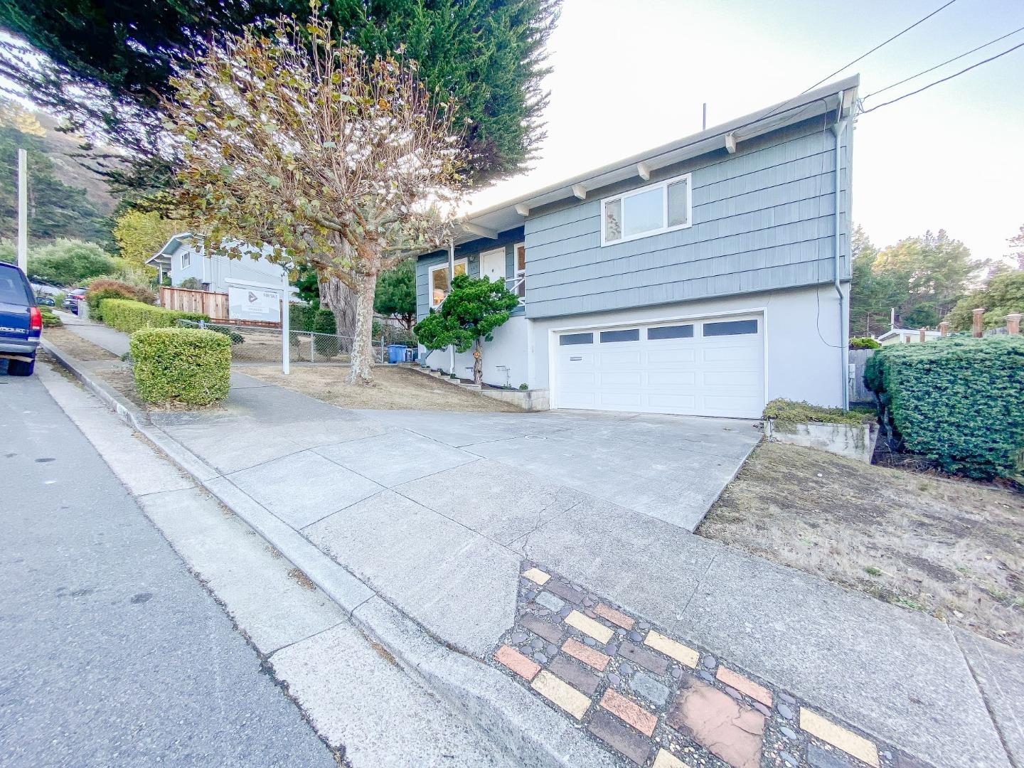 266 Hillside Drive Pacifica, CA 94044 - Photo 34 of 37 a view of a house with a street