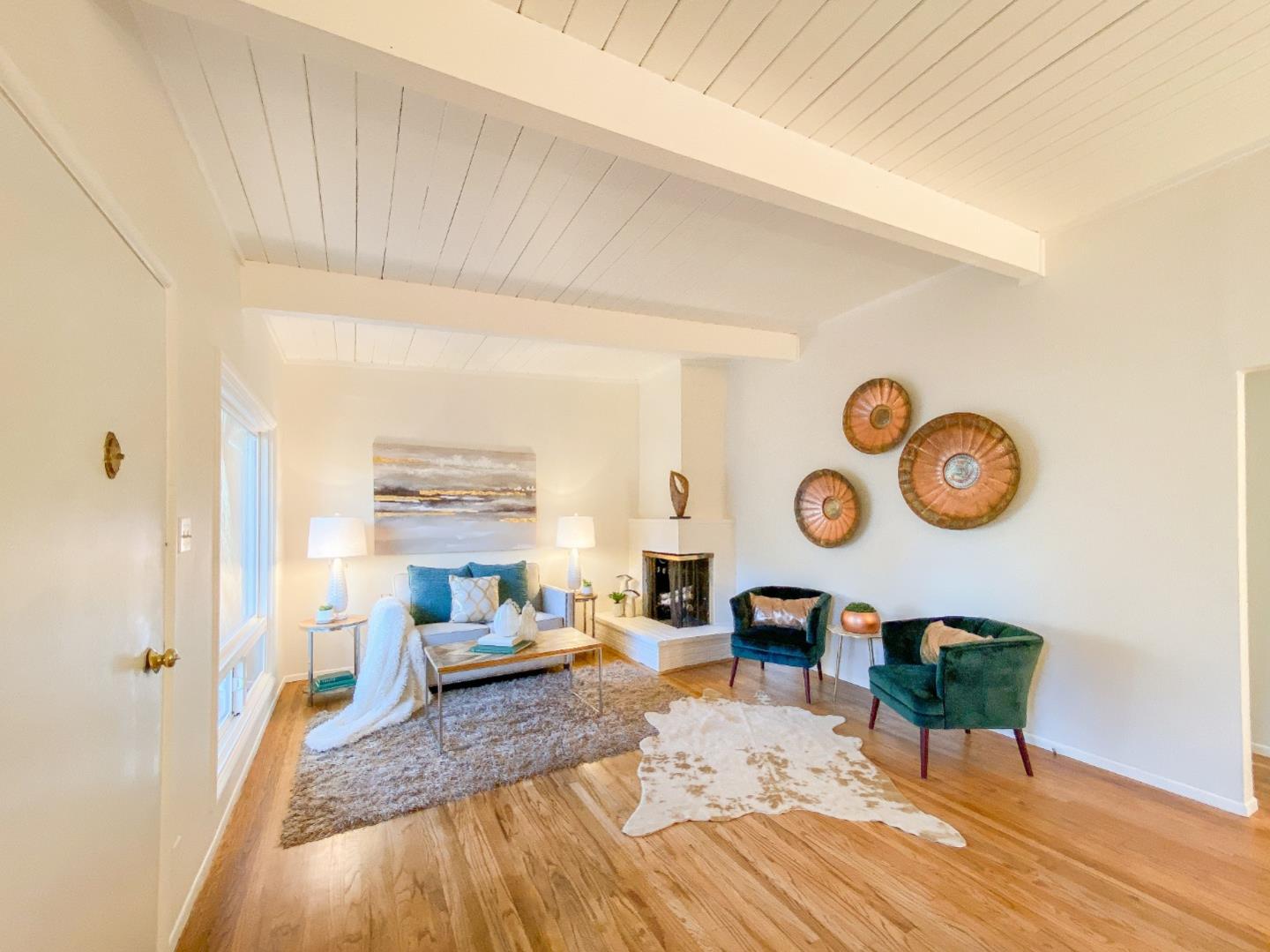 266 Hillside Drive Pacifica, CA 94044 - Photo 5 of 37 a living room with furniture and a large window