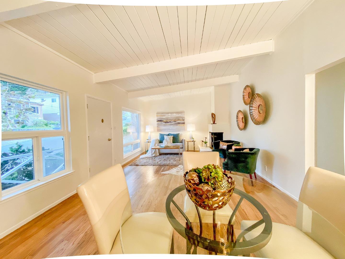 266 Hillside Drive Pacifica, CA 94044 - Photo 8 of 37 a living room with furniture and a table