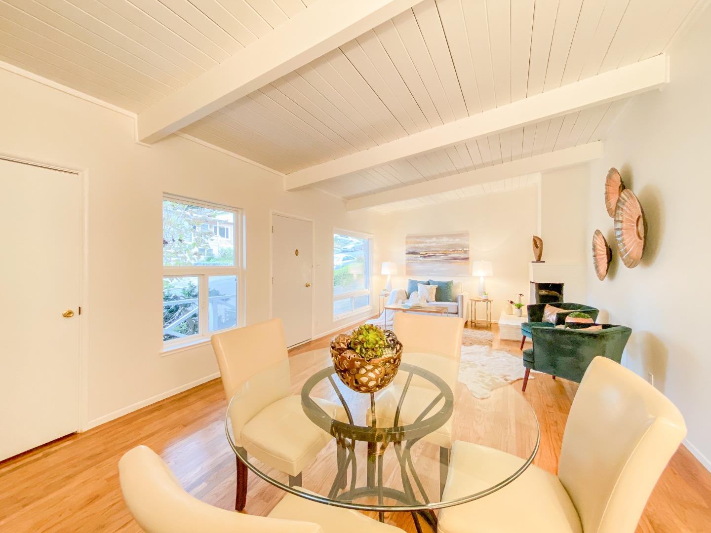 266 Hillside Drive Pacifica, CA 94044 - Photo 9 of 37 a living room with furniture and a table