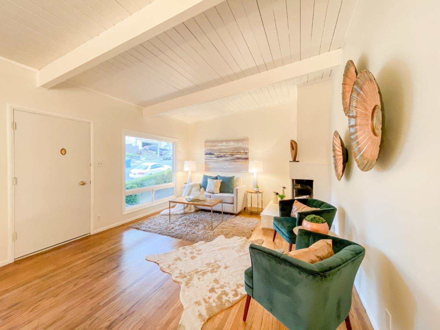 266 Hillside Drive Pacifica, CA 94044 - Photo 10 of 37 a living room with furniture and a window