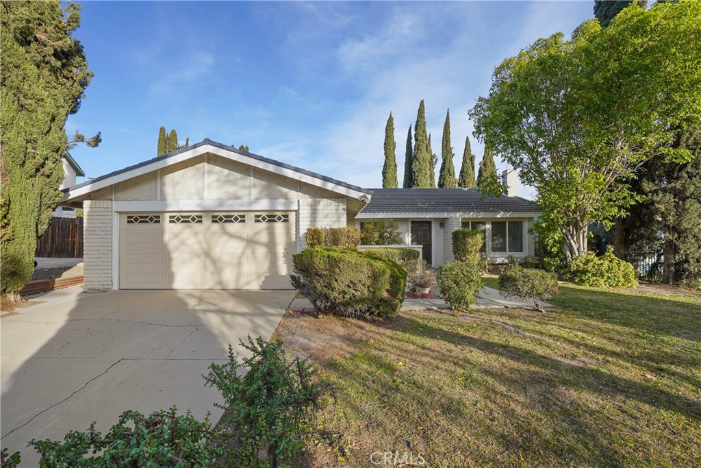482 Wrangler Way Walnut, CA 91789 - Photo 1 of 1 a front view of a house with garden