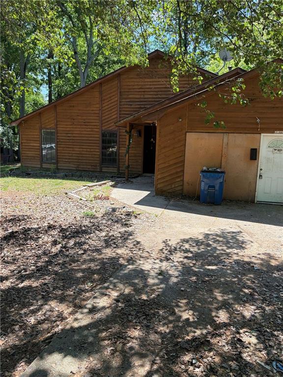 8521 Cedar Creek Ridge Riverdale, GA 30274 - Photo 1 of 9 a backyard of a house