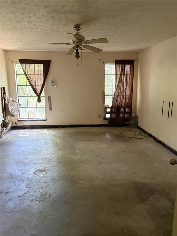 8521 Cedar Creek Ridge Riverdale, GA 30274 - Photo 5 of 9 an empty room with windows