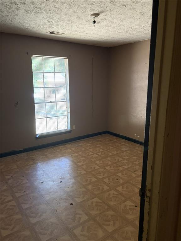 8521 Cedar Creek Ridge Riverdale, GA 30274 - Photo 8 of 9 an empty room with a window