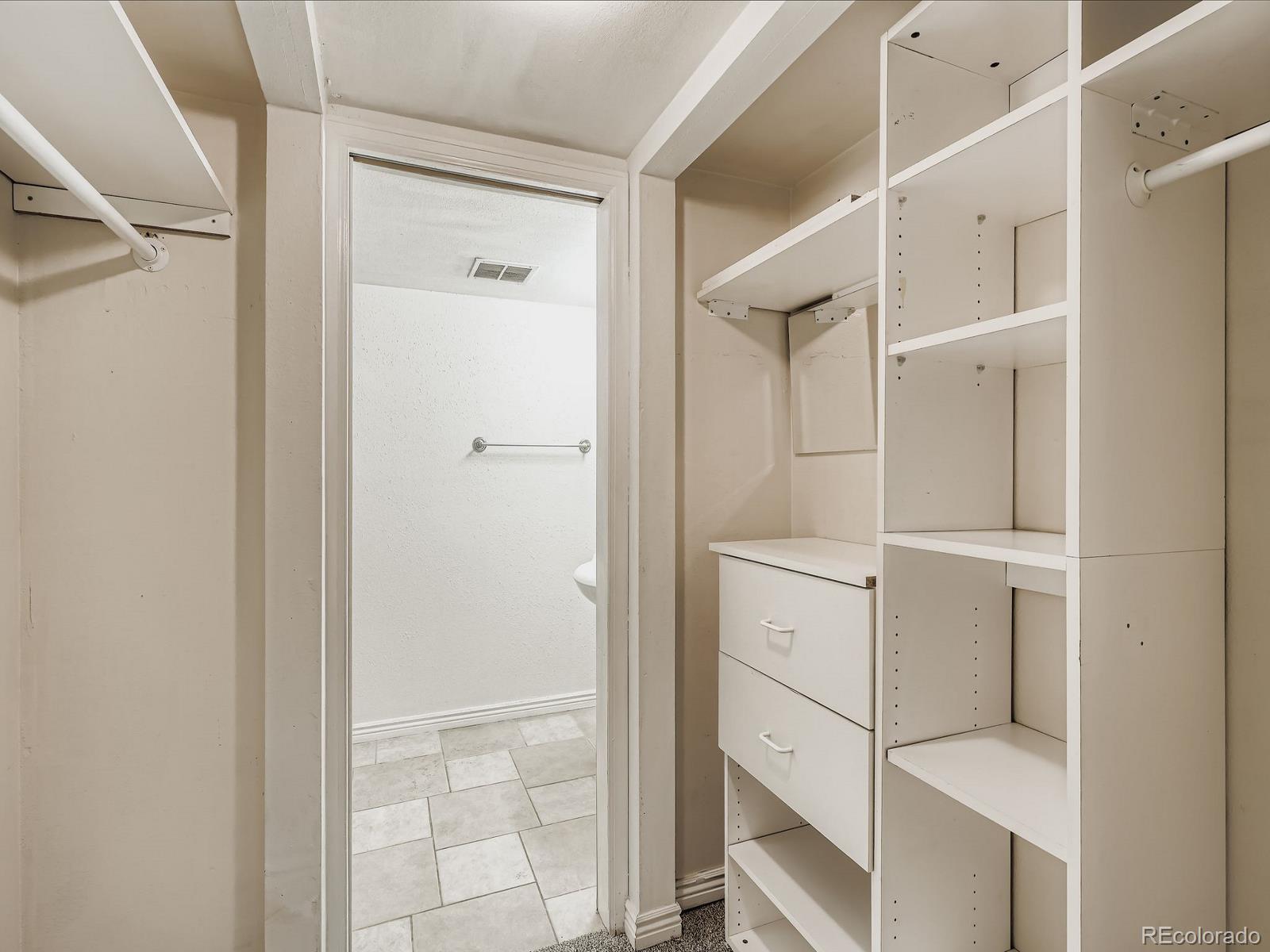 3420 South Locust Street, Unit D Denver, CO 80222 - Photo 13 of 16 a view of walk in closet