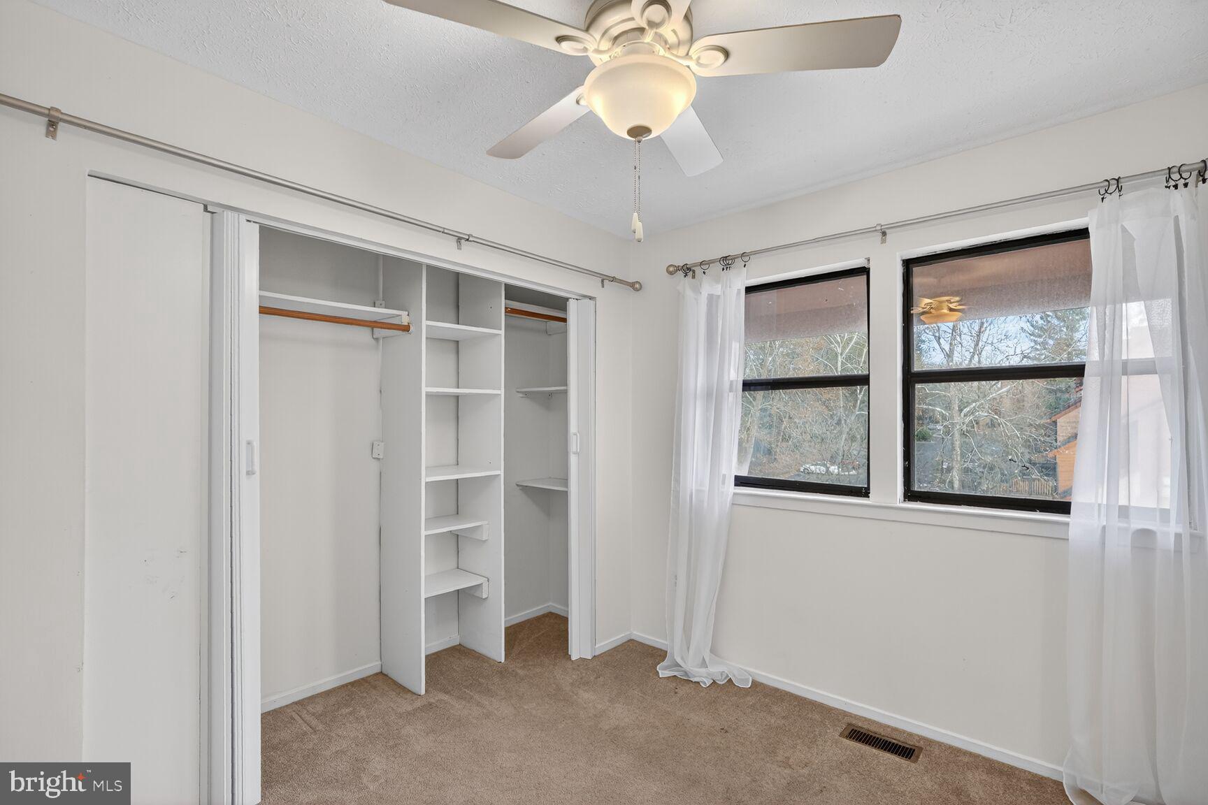 7505 Weather Worn Way, Unit E Columbia, MD 21046 - Photo 16 of 32 a view of an empty room with a window