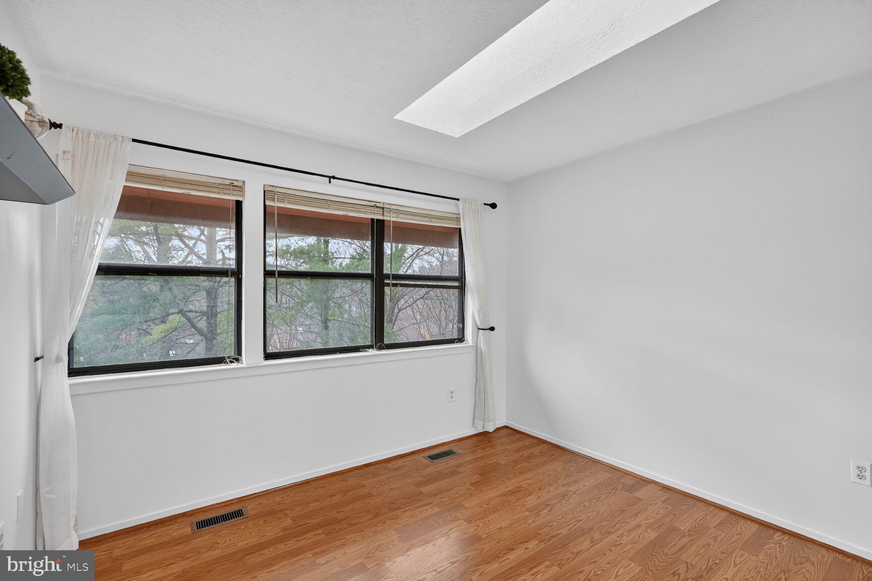 7505 Weather Worn Way, Unit E Columbia, MD 21046 - Photo 20 of 32 an empty room with a window