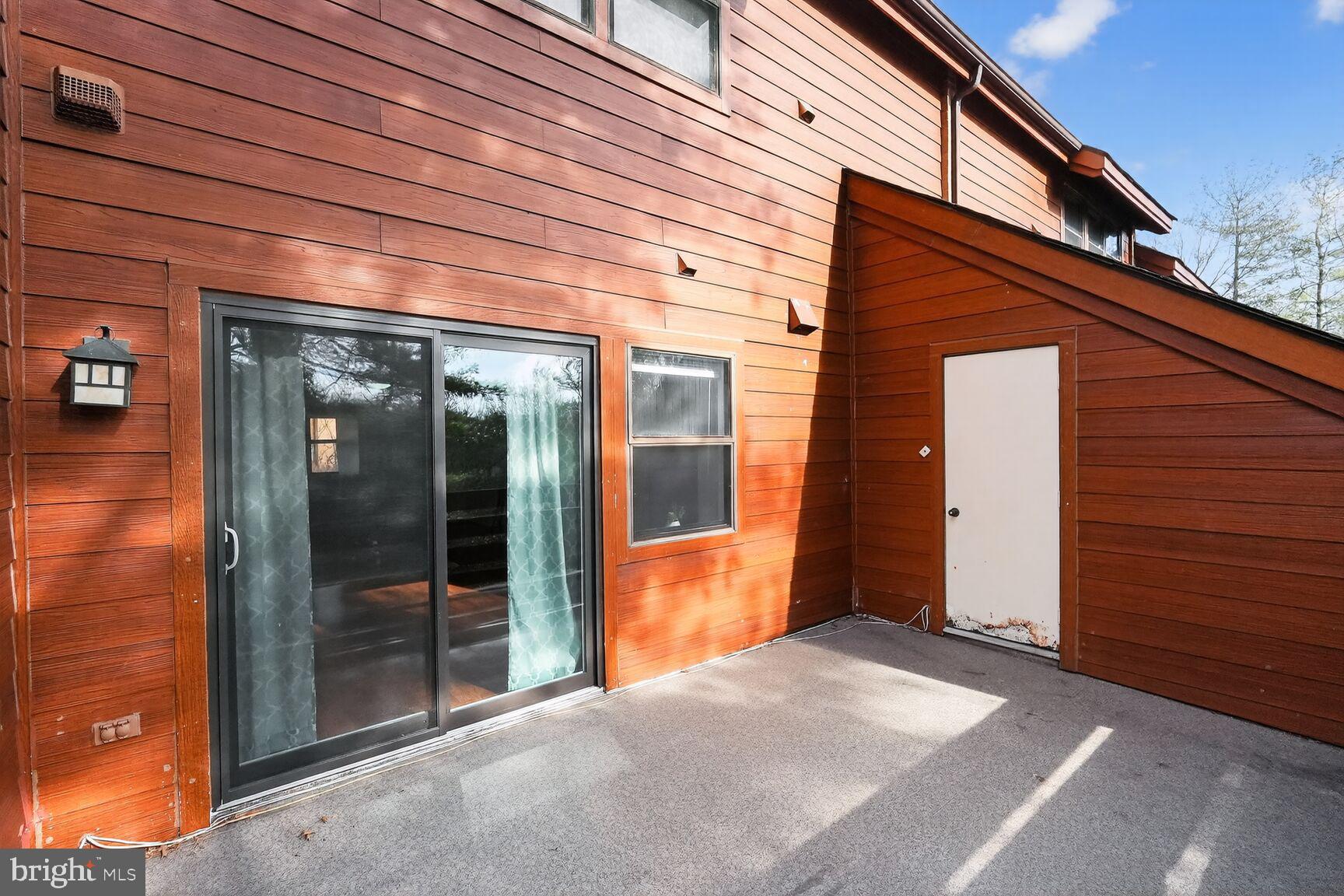 7505 Weather Worn Way, Unit E Columbia, MD 21046 - Photo 28 of 32 a view of a backyard of a house