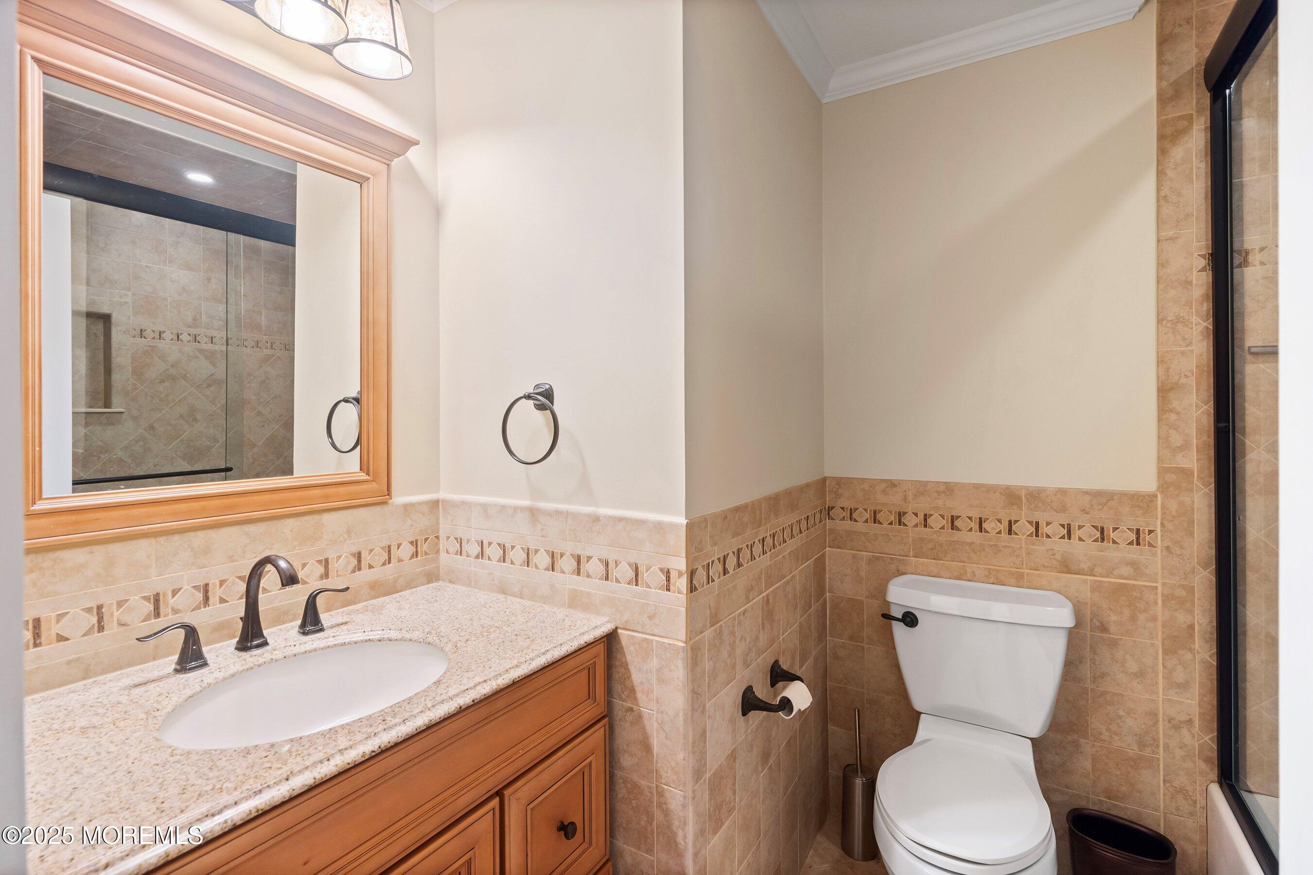 29 Pine Needle Street Howell, NJ 07731 - Photo 14 of 26 a bathroom with a granite countertop toilet sink and mirror