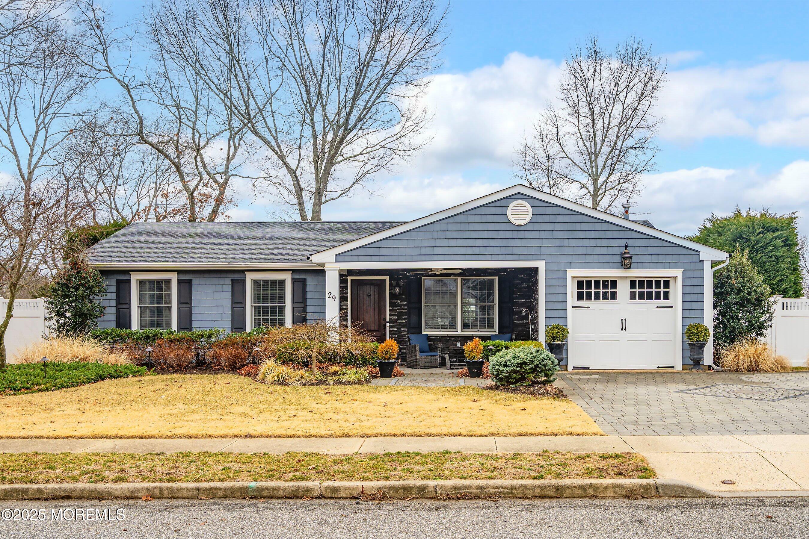 29 Pine Needle Street Howell, NJ 07731 - Photo 2 of 26 a front view of a house with a yard