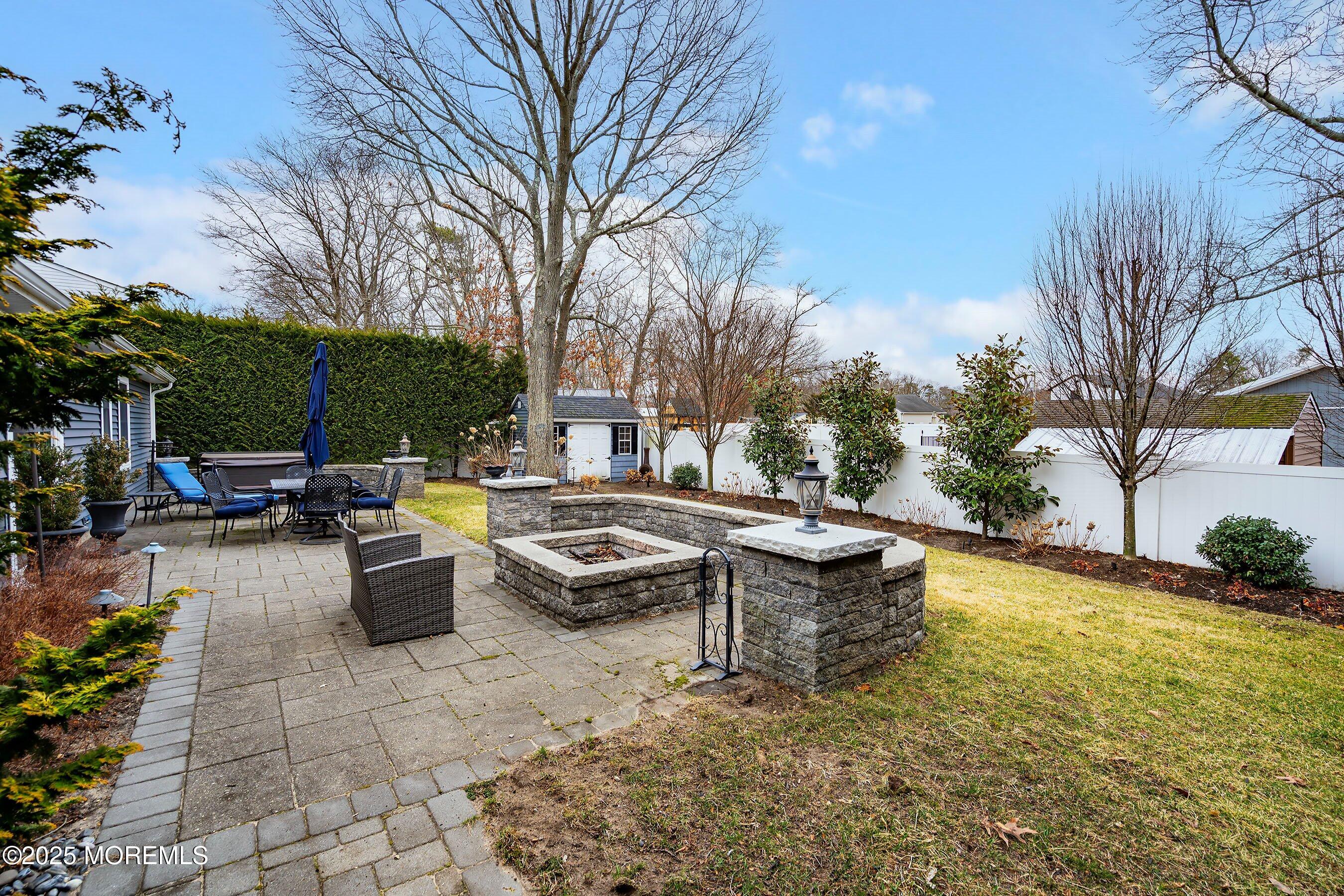 29 Pine Needle Street Howell, NJ 07731 - Photo 24 of 26 a view of a swimming pool with outdoor seating