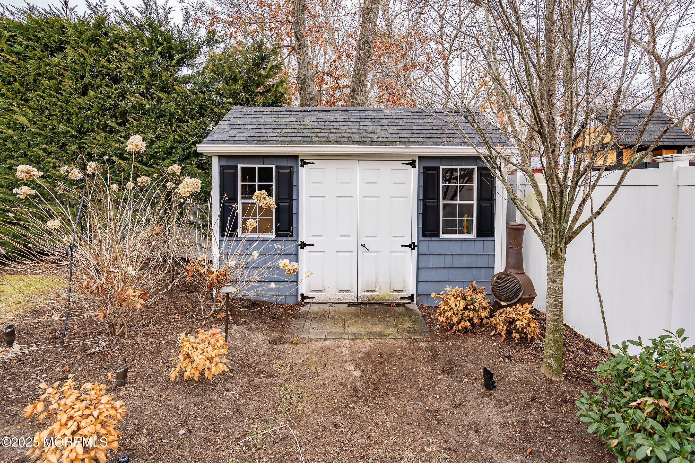 29 Pine Needle Street Howell, NJ 07731 - Photo 25 of 26 a view of a house with a yard