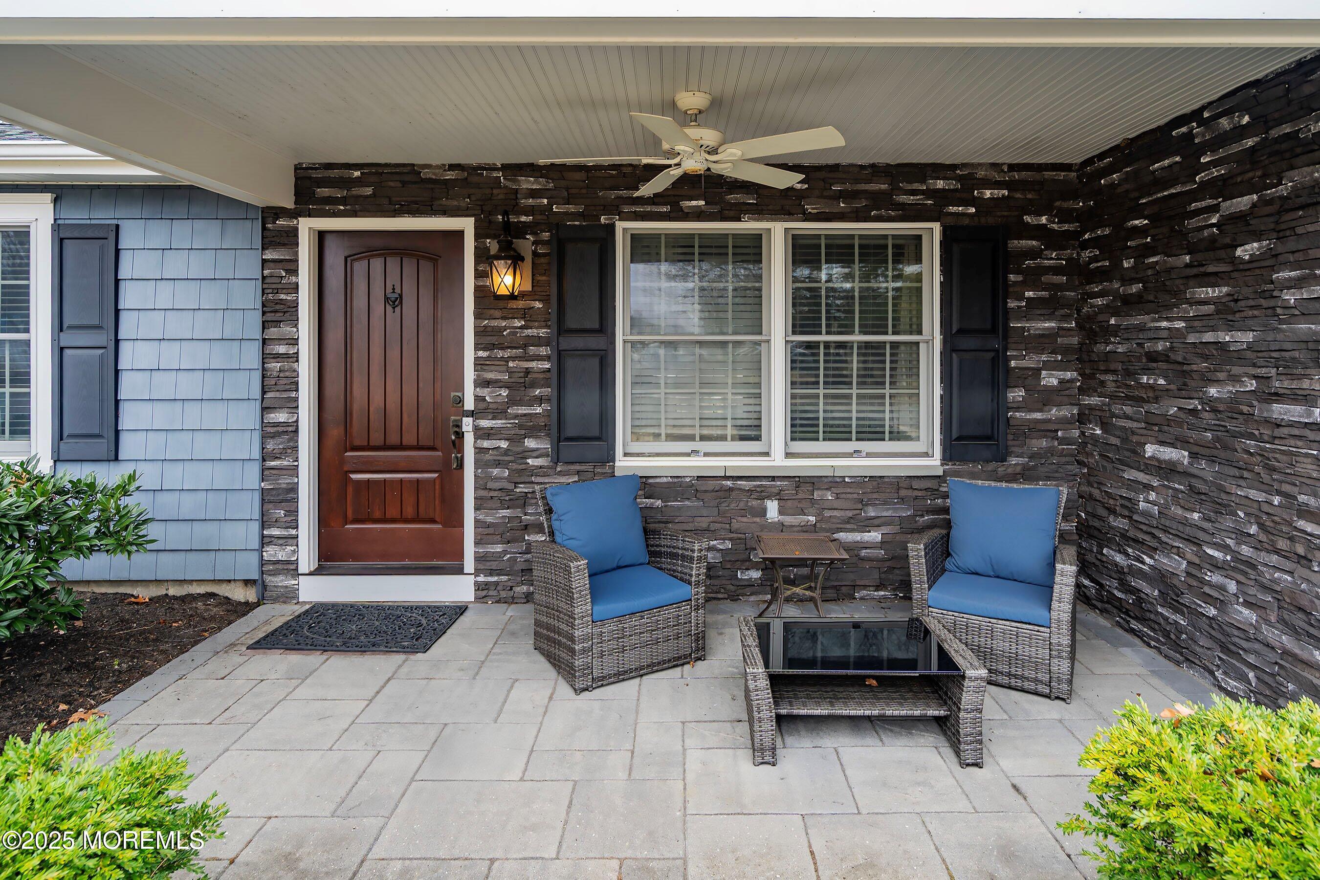 29 Pine Needle Street Howell, NJ 07731 - Photo 3 of 26 a bench sitting in front of a building