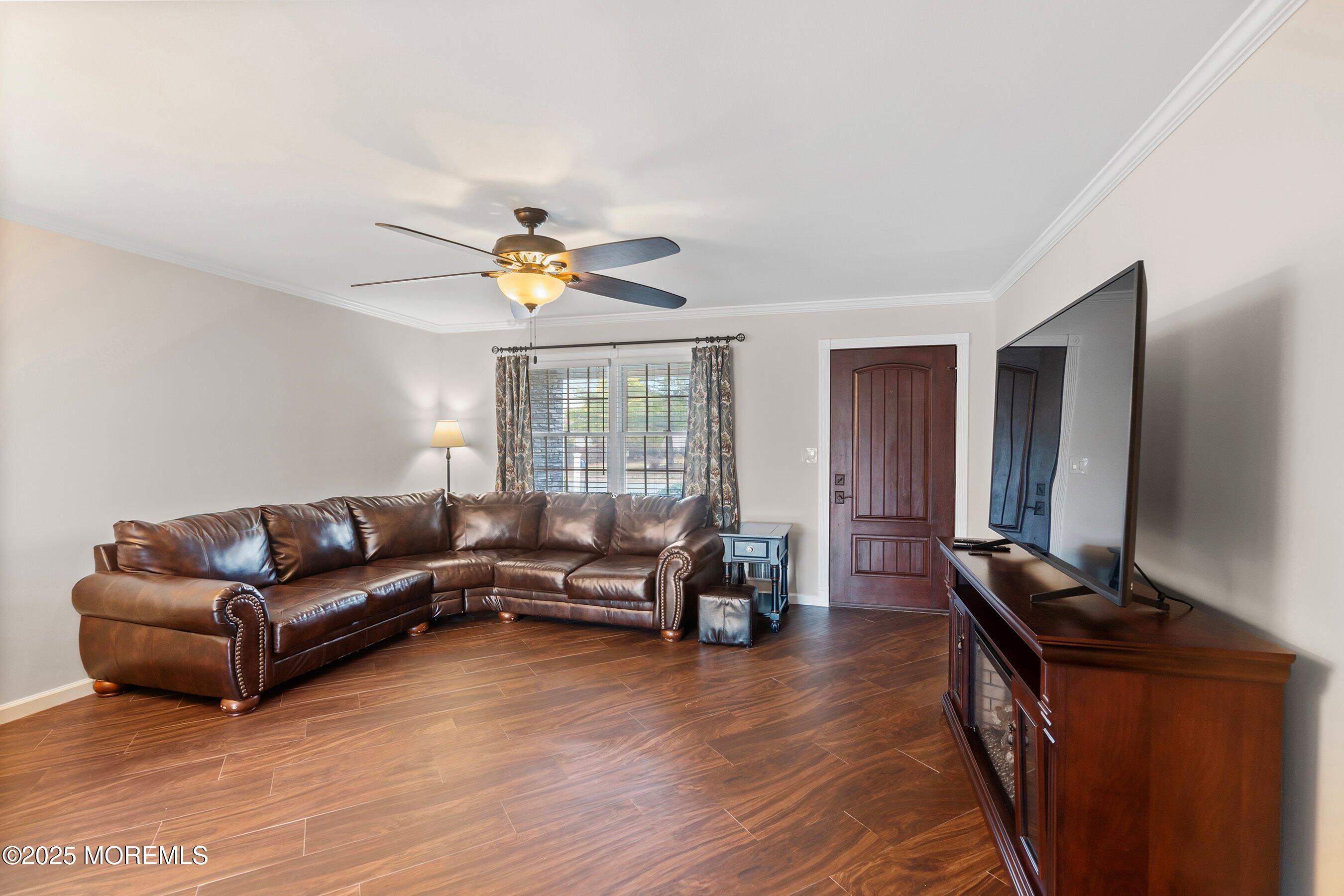 29 Pine Needle Street Howell, NJ 07731 - Photo 4 of 26 a living room with furniture and a window