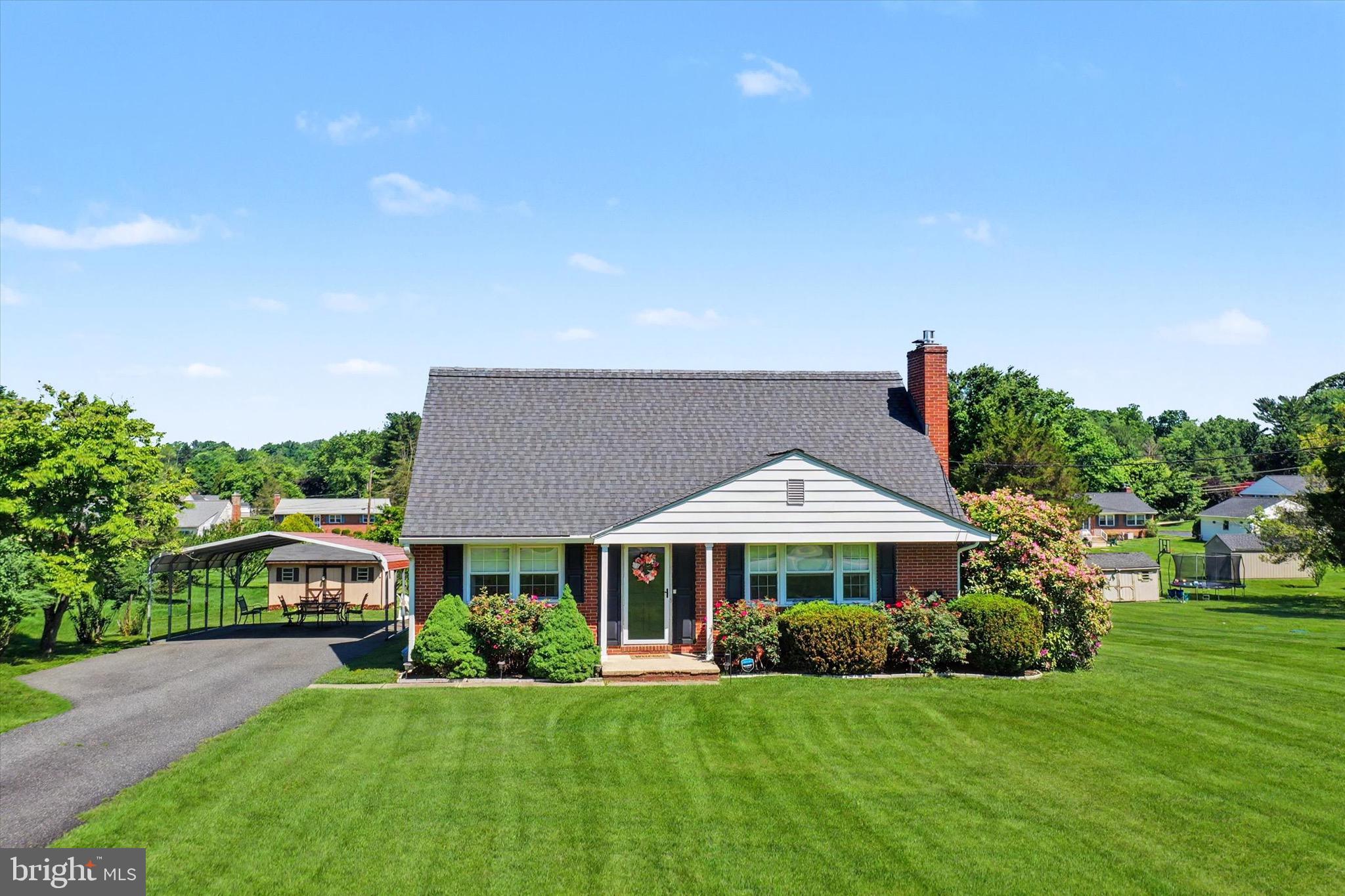 Beautifully Updated Brick Front Cape Cod