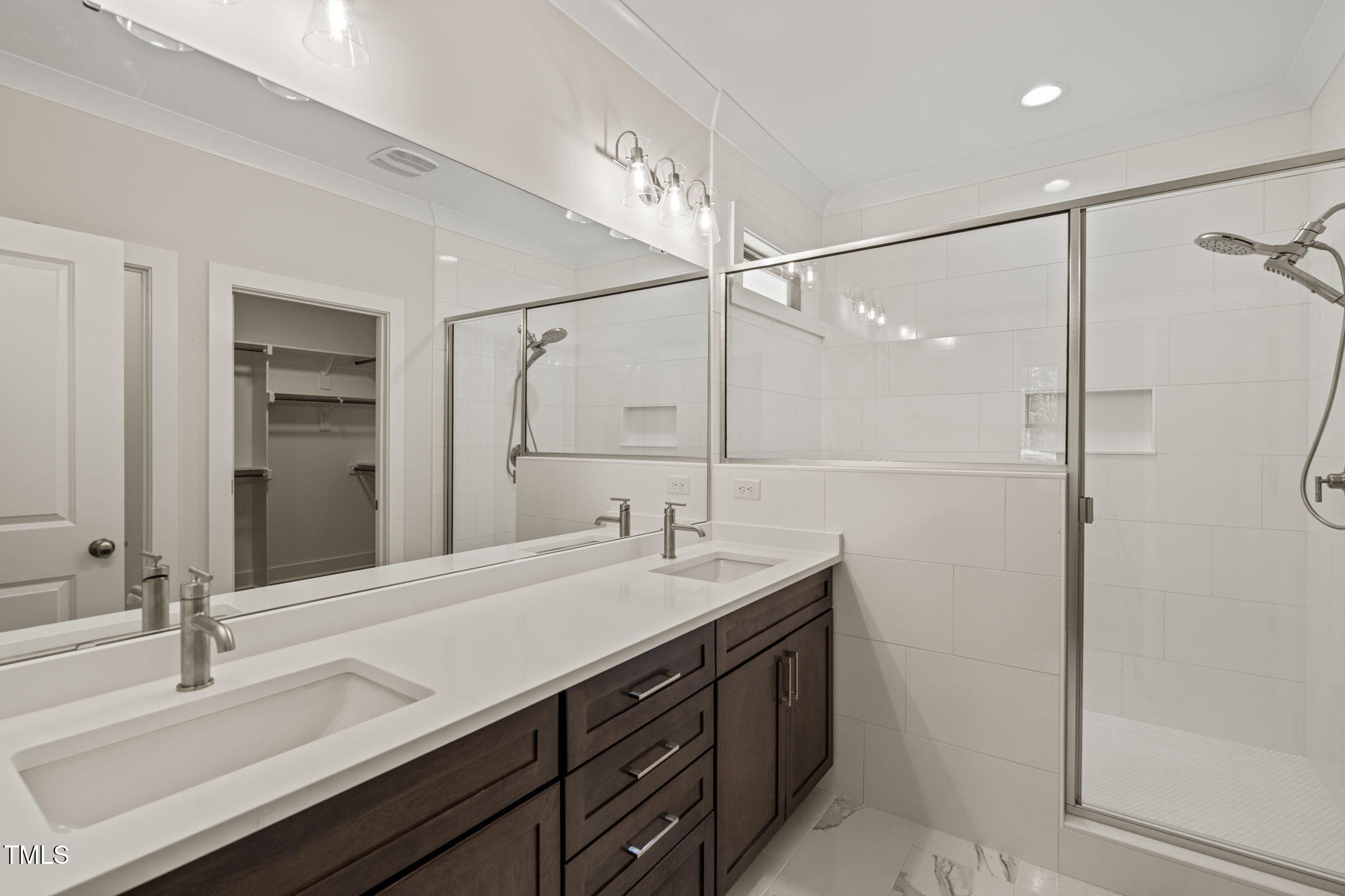 310 Pilot Ridge Road Zebulon, NC 27597 - Photo 22 of 46 a bathroom with a sink and a mirror