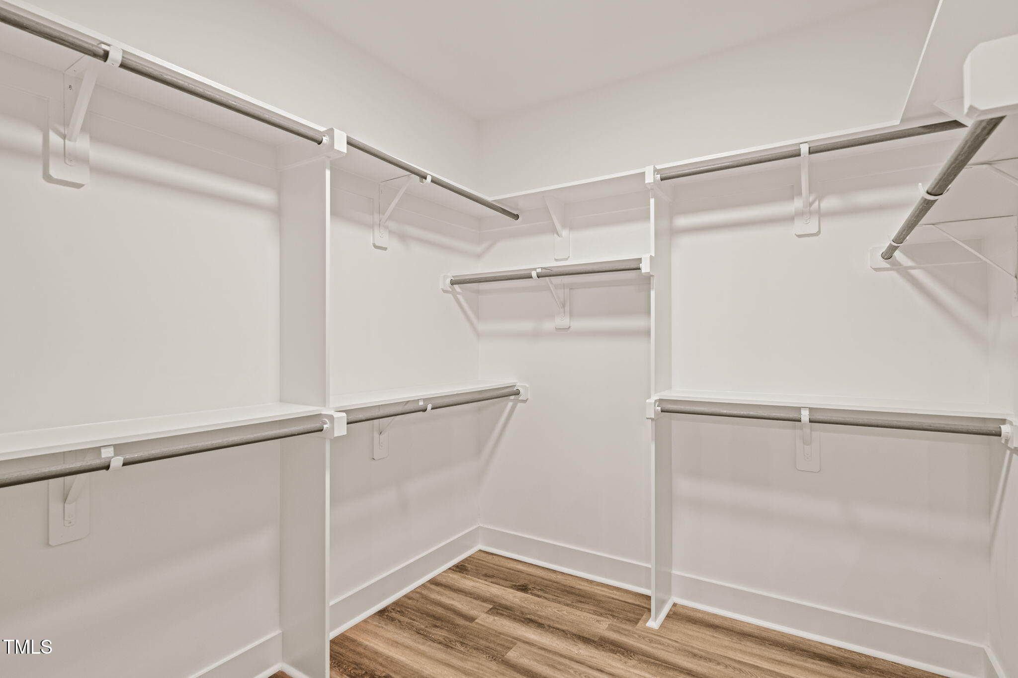 310 Pilot Ridge Road Zebulon, NC 27597 - Photo 23 of 46 a view of an empty walk in closet