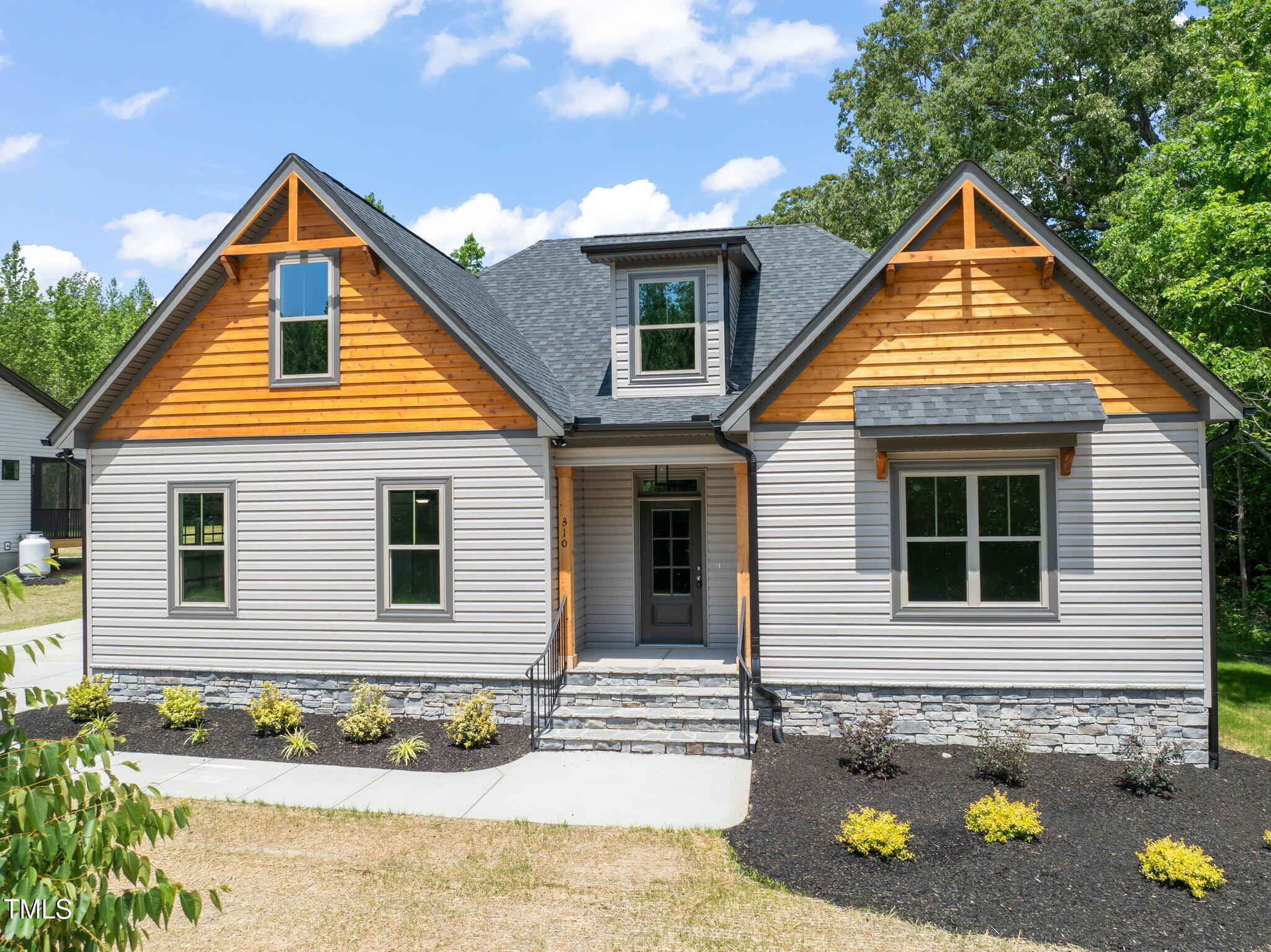 310 Pilot Ridge Road Zebulon, NC 27597 - Photo 3 of 46 a view of a backyard of the house