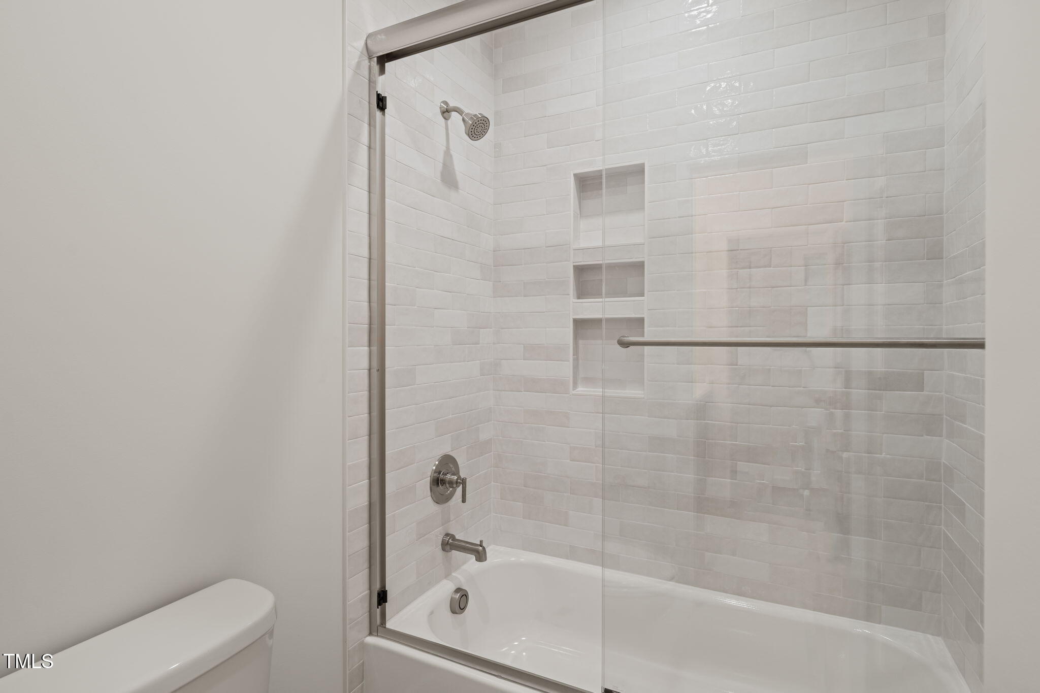 310 Pilot Ridge Road Zebulon, NC 27597 - Photo 31 of 46 a bathroom with a bathtub and a toilet