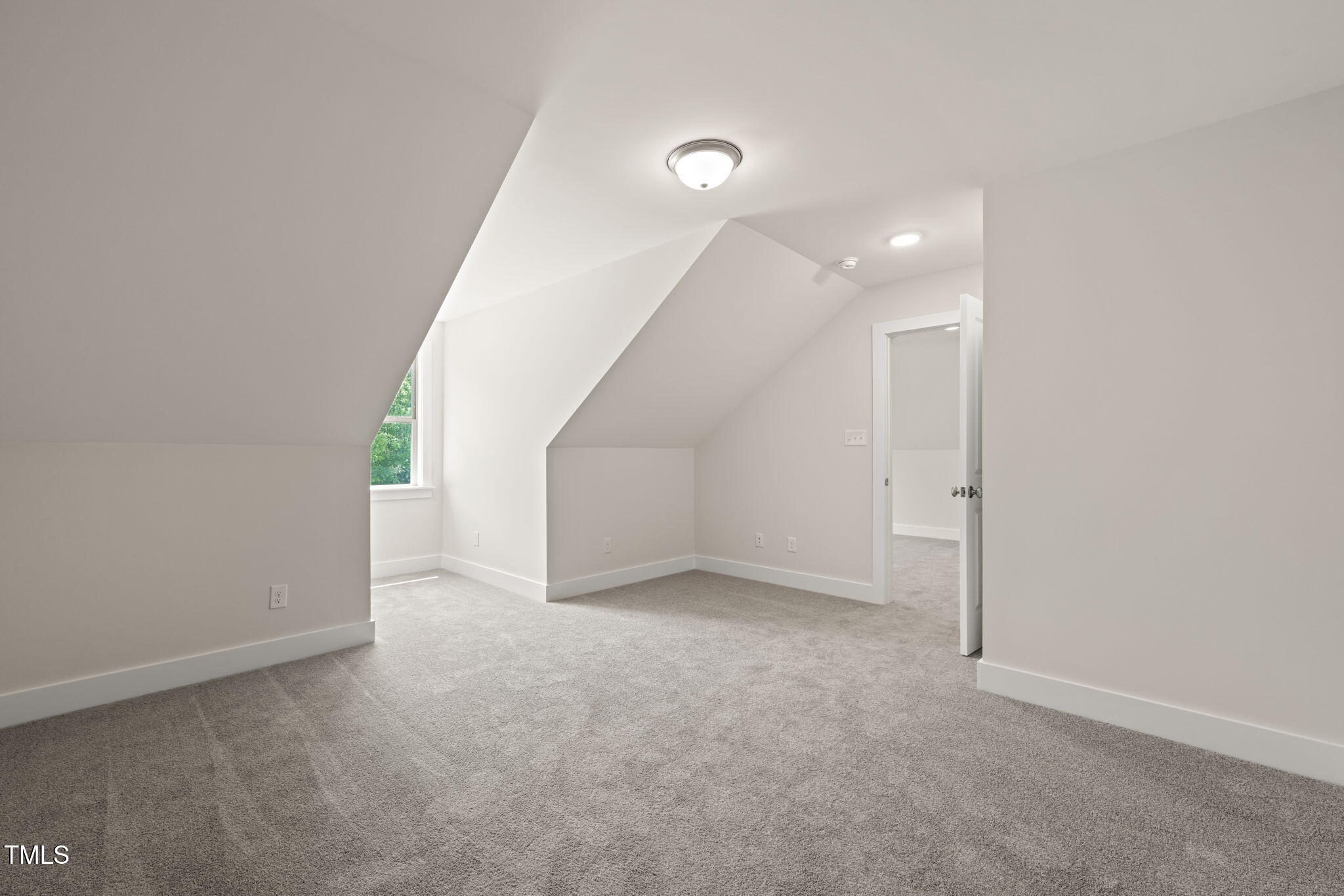 310 Pilot Ridge Road Zebulon, NC 27597 - Photo 32 of 46 a view of an empty room with a window
