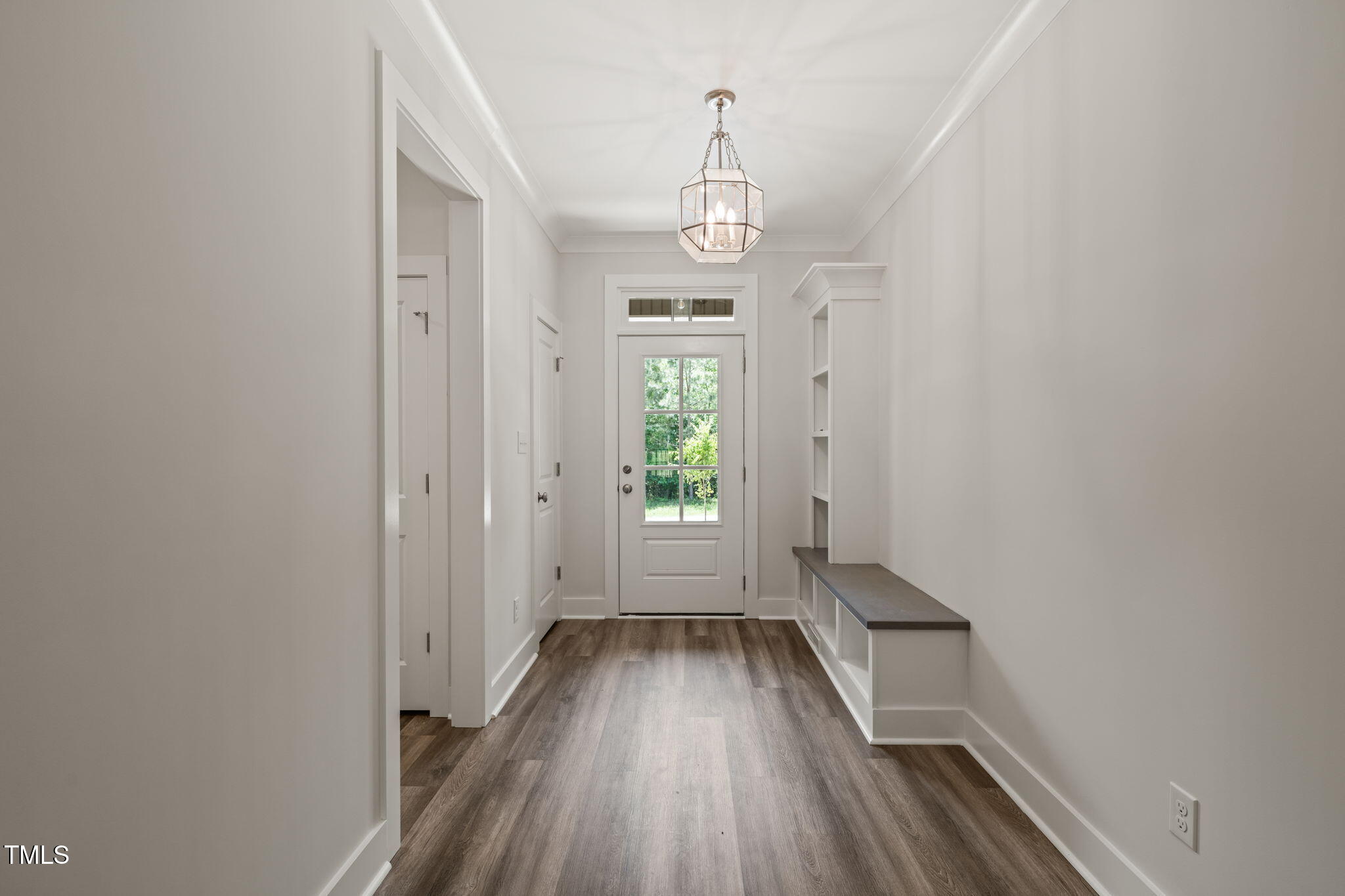 310 Pilot Ridge Road Zebulon, NC 27597 - Photo 4 of 46 a view of a hallway with wooden floor and staircase