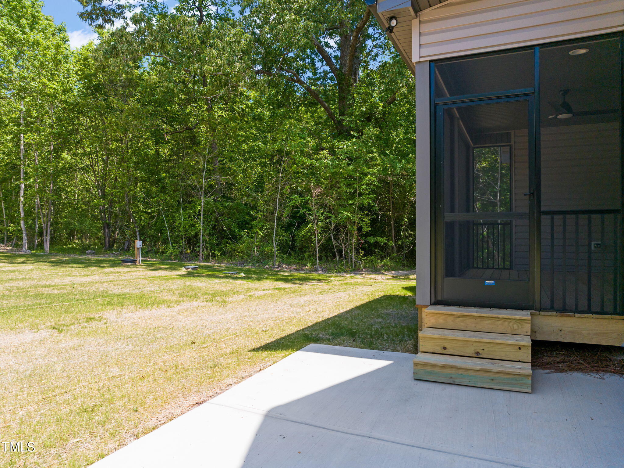 310 Pilot Ridge Road Zebulon, NC 27597 - Photo 41 of 46 a swimming pool with outdoor seating and yard