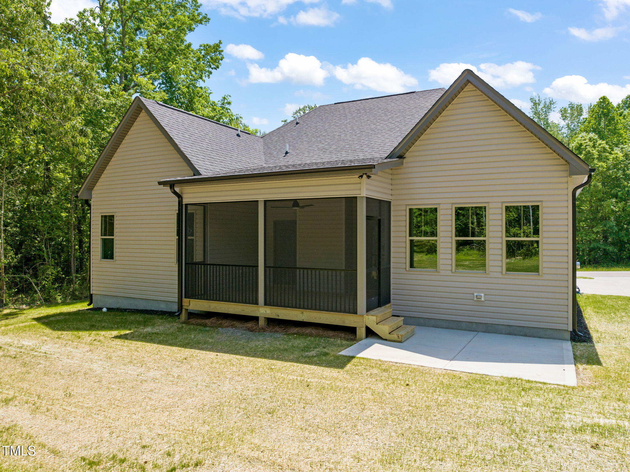 310 Pilot Ridge Road Zebulon, NC 27597 - Photo 42 of 46 a view of a house with a yard