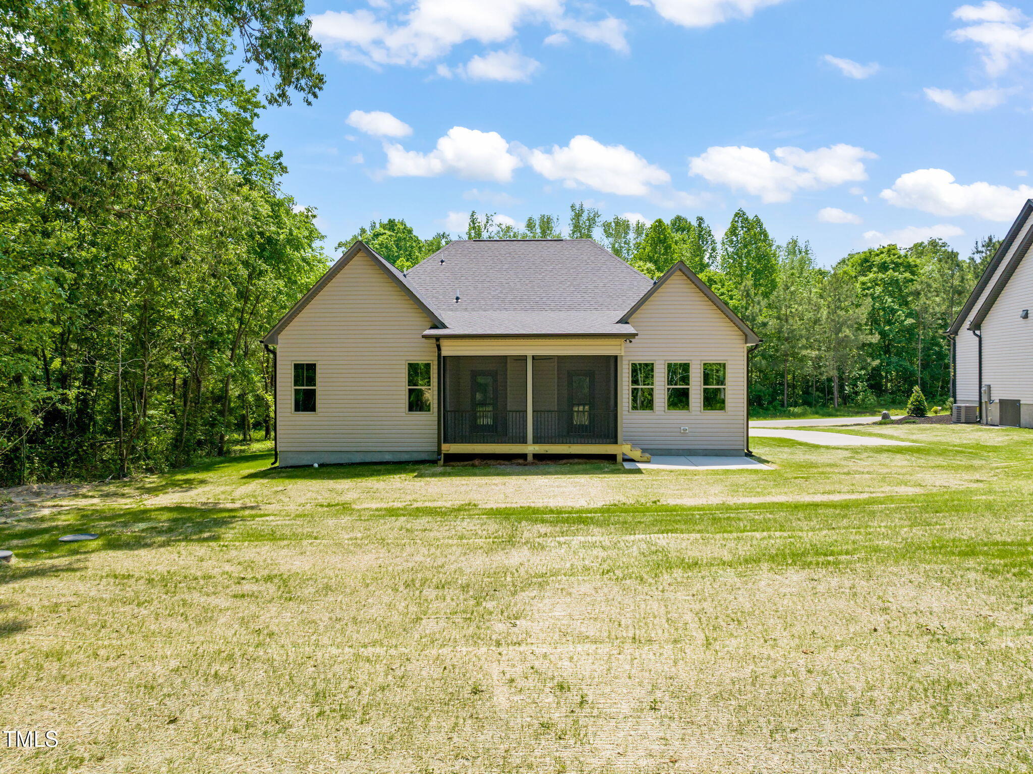 310 Pilot Ridge Road Zebulon, NC 27597 - Photo 44 of 46 a view of a house with a swimming pool and a yard