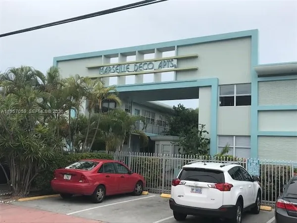a front view of a house with parking