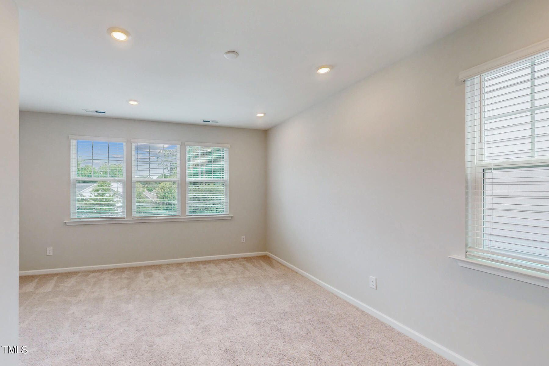 2403 Greshford Lane Raleigh, NC 27615 - Photo 30 of 35 large bonus room on the second floor- perfect for hanging out or watching the game