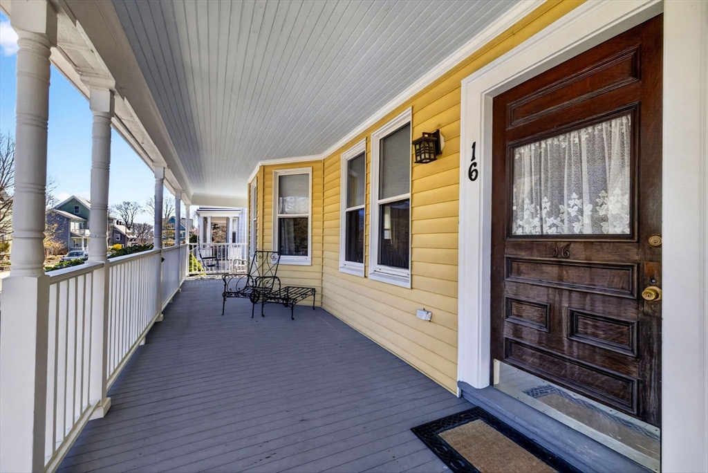 16 Primrose Street, Unit 3 Boston, MA 02131 - Photo 20 of 26 a view of a porch with wooden floor and furniture