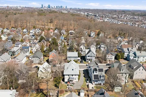 an aerial view of a city with lots of residential buildings